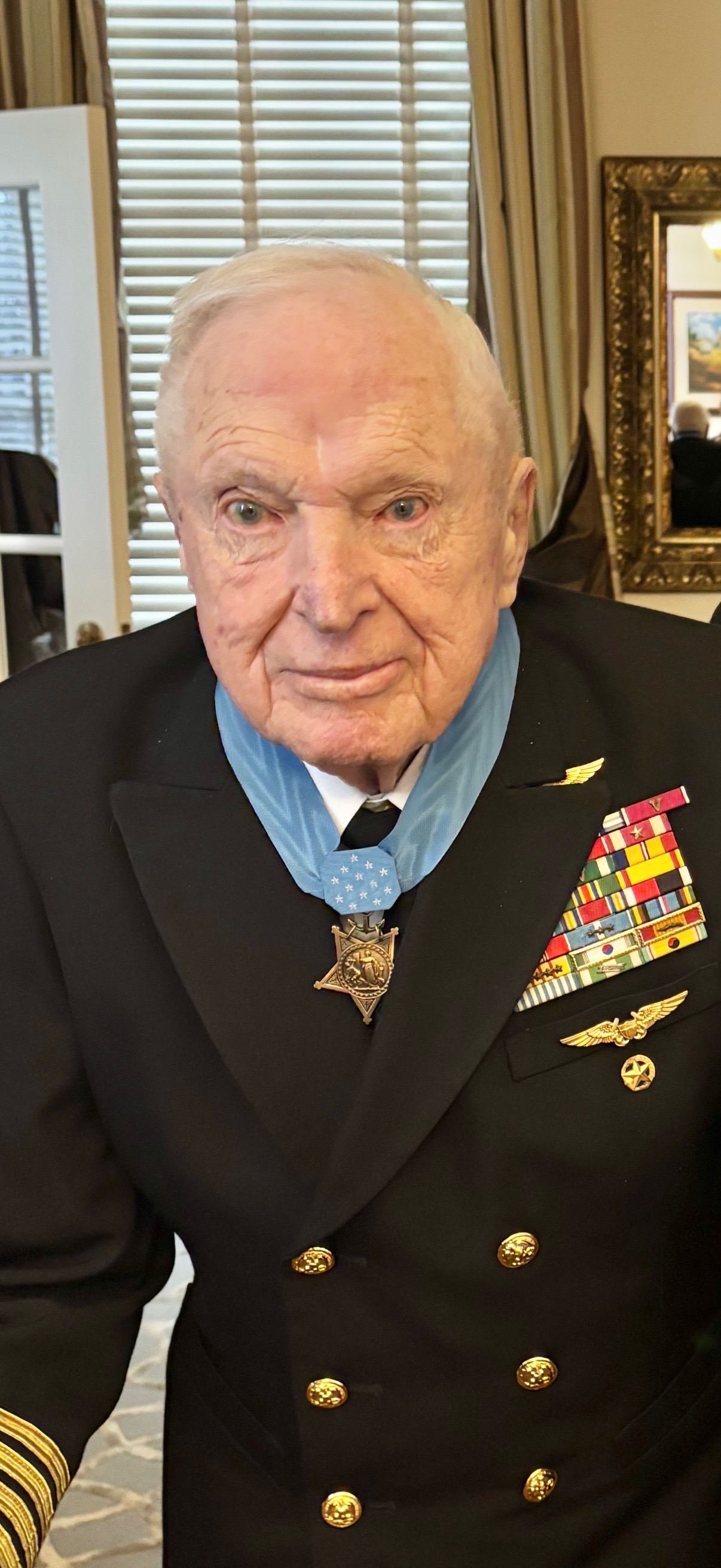 Captain Royce Williams in formal uniform with Medal of Honor