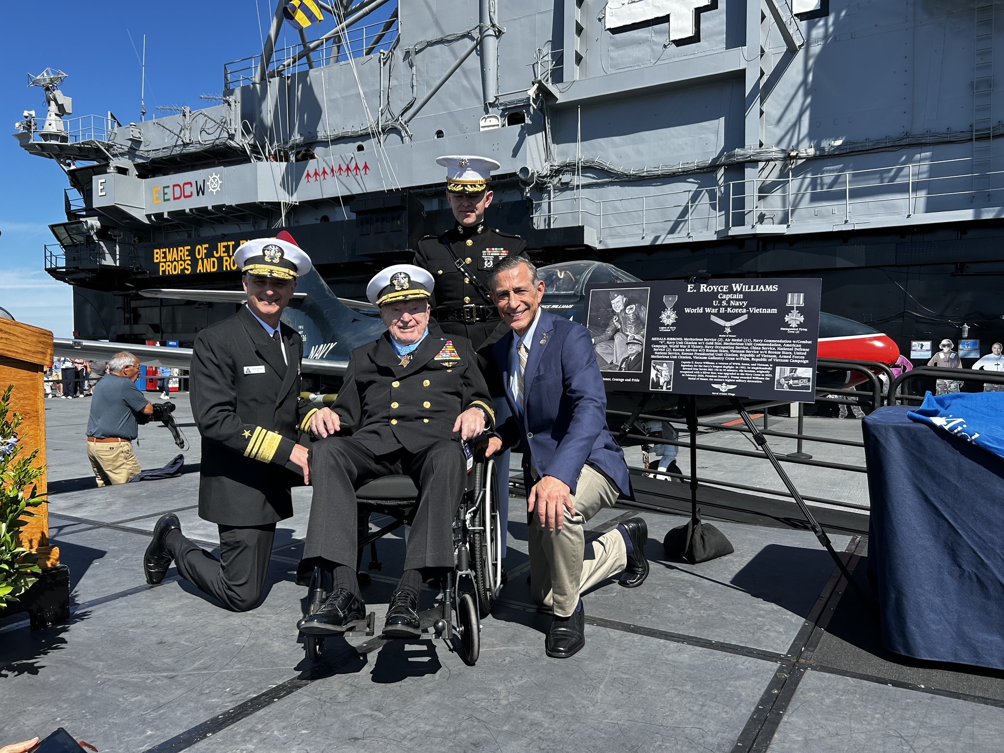Captain Williams with Navy officers and Congressman Issa aboard USS Midway