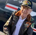 Captain Williams saluting at age 100